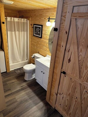 Shower, towels, soap, toilet paper