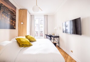 3 slaapkamers, een bureau, een strijkplank/strijkijzer, wifi