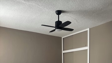 Desk, laptop workspace, blackout curtains, iron/ironing board