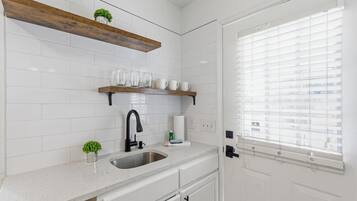 Fridge, microwave, coffee/tea maker, toaster