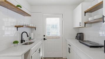 Fridge, microwave, coffee/tea maker, toaster