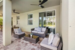 Terrace/patio - New 8BR Luxury Retreat • Pool & Spa • Near Disney (Kissimmee)