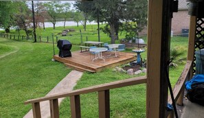 Outdoor dining - Serene 3-bedroom country Lakefront house  in charming Trinity with AC (Trinity)