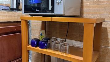 Comfort Apartment, Balcony | Private kitchen | Full-size fridge, microwave, oven, cookware/dishes/utensils