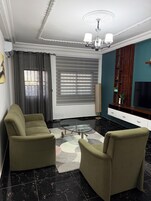 Apartamento Confort, balcón | Zona de estar