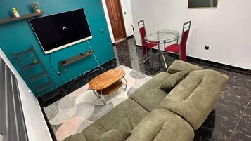 Deluxe Apartment, Balcony, City View | Living area