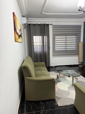 Comfort Apartment, Balcony | Living area - ZonaVille Appartement Meuble (Yaounde)