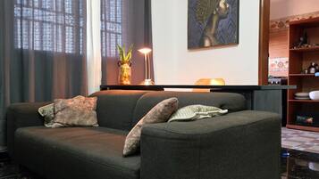 Appartement Deluxe, balcon, vue ville | Coin séjour