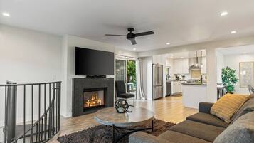 House (3 Bedrooms) | Living area | TV, fireplace