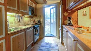 Réfrigérateur, four, lave-vaisselle, cafetiÚre/bouilloire