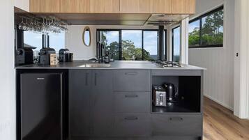 Fridge, microwave, stovetop, coffee/tea maker