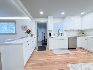 Fridge, microwave, oven, stovetop - Modern 5BR Burien Retreat • Close to SEA Airport • Sleeps Large Groups (Burien)