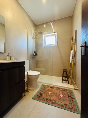 Hair dryer, towels, soap, shampoo