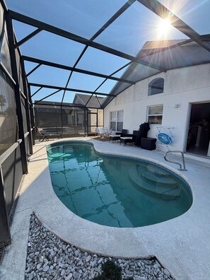 Indoor pool, a heated pool - Charming 3-bedroom house in Southern Dunes with enclosed private pool (Haines City)