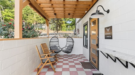 Terrace/patio. 1AN Farm Stay at a Luxury Barndominium Fluffy Cows in the field & get Fresh Eggs