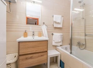 A modern bathroom with a sink, mirror, and shower. - The Grandfather Villa Heated Pool Retreat (Stankovci)