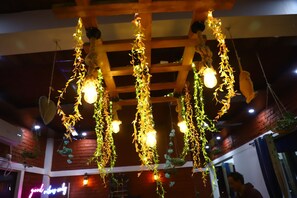 Couples dining - The Tiger Waterfront Resort (Puranpur)