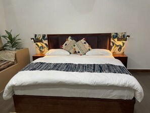 Luxury Cottage, Private Pool, Garden View | Desk, laptop workspace, blackout drapes, iron/ironing board