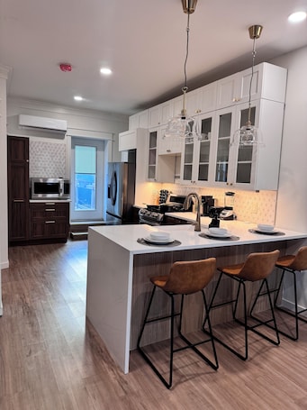 Fridge, microwave, oven, stovetop. 2-Story Townhome + Driveway + 15 Min to EWR + Easy NYC Access