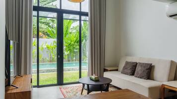 Superior Double Room | Living room | 55-inch Smart TV with digital channels