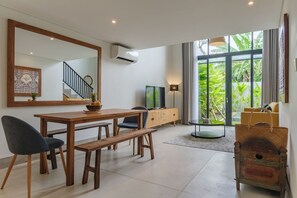 Deluxe Double Room | Desk, laptop workspace, blackout drapes, iron/ironing board - Sunset Loft Seminyak, Bali (Seminyak)