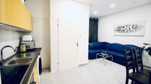 Apartamento básico | Sala de estar