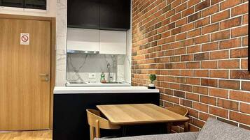 Appartement Deluxe, balcon, vue ville | Coin séjour