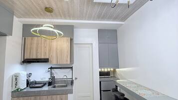 Fridge, microwave, stovetop, electric kettle