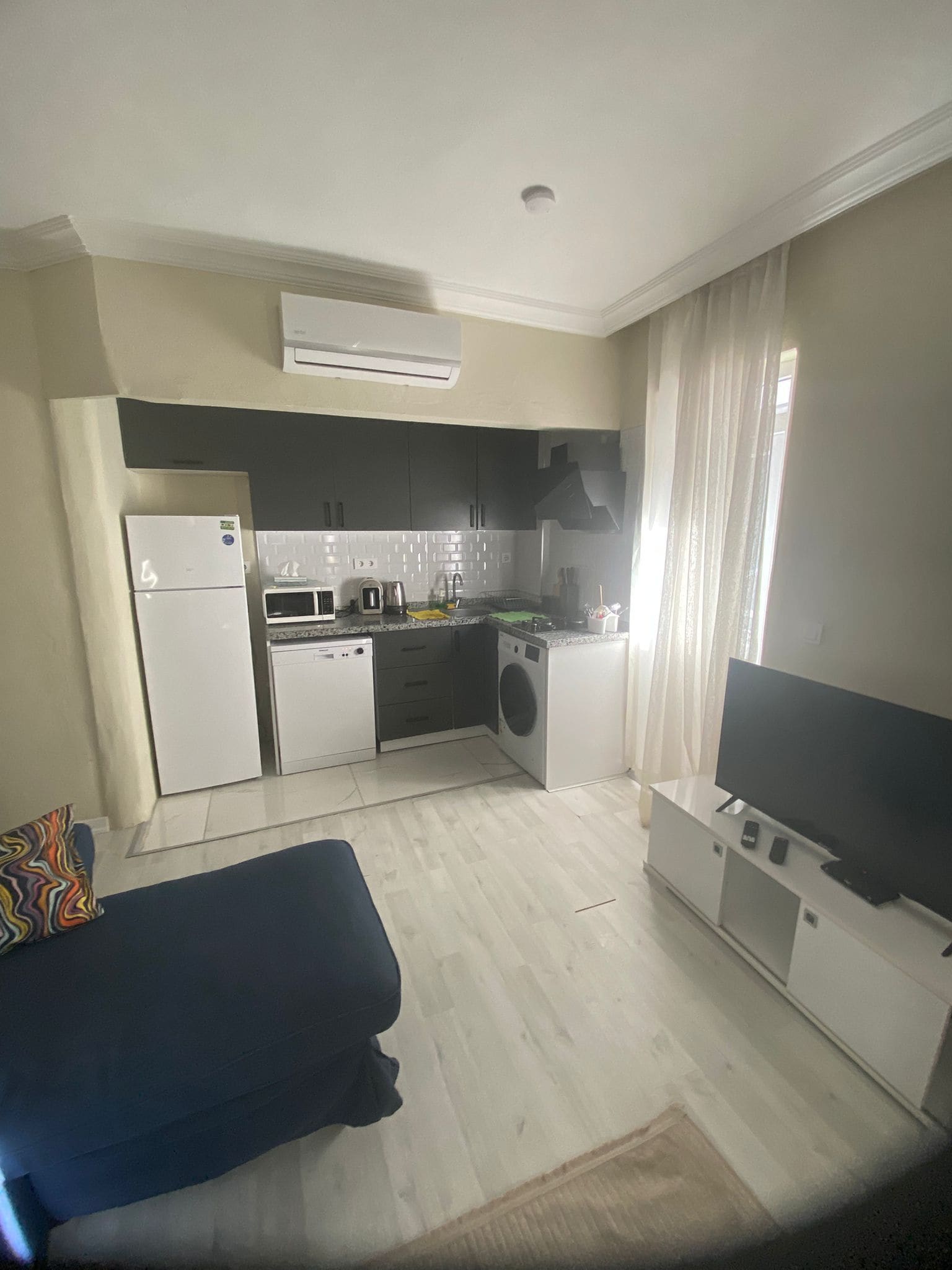 Appartement Deluxe, 1 grand lit et 1 canapé-lit, balcon | Coin séjour