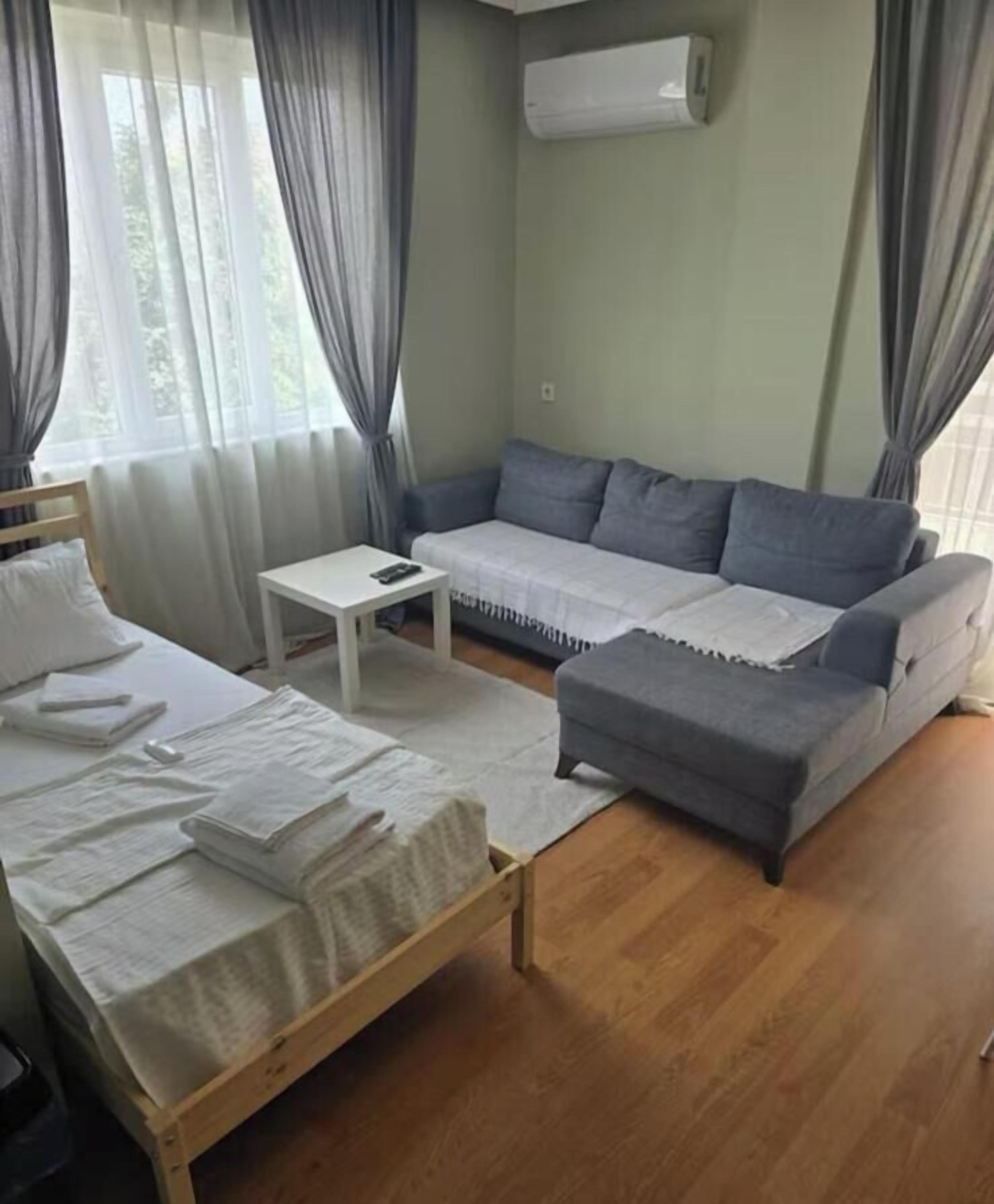 Family Apartment, Multiple Beds, Balcony | Living area