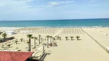 Sulla spiaggia, teli da spiaggia