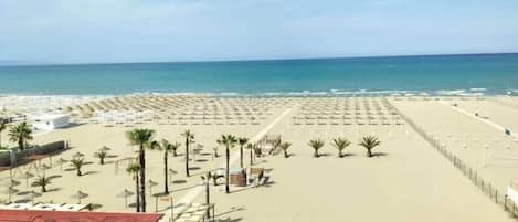 On the beach, beach towels