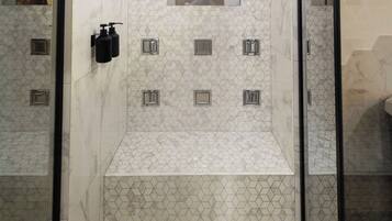 Jetted tub, hair dryer, towels, soap