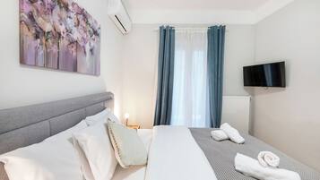 Apartment, 3 Bedrooms | Iron/ironing board, free WiFi