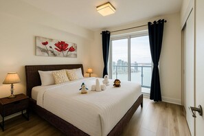 Iron/ironing board, WiFi, bed sheets - RivetStays | The Atmos Family Suite – 3BR/2BA Condo (Toronto)