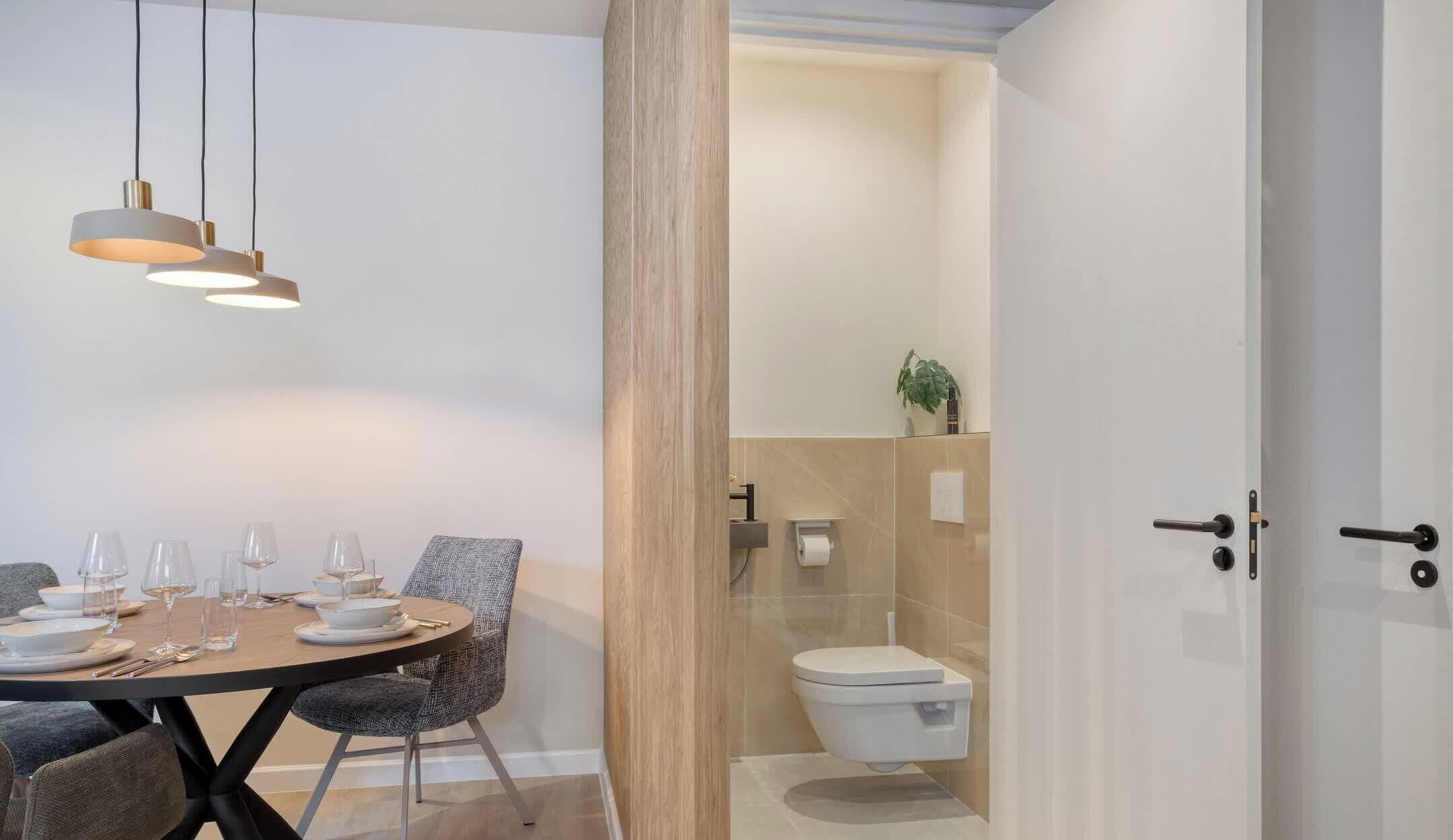 Shower, hair dryer, towels, shampoo