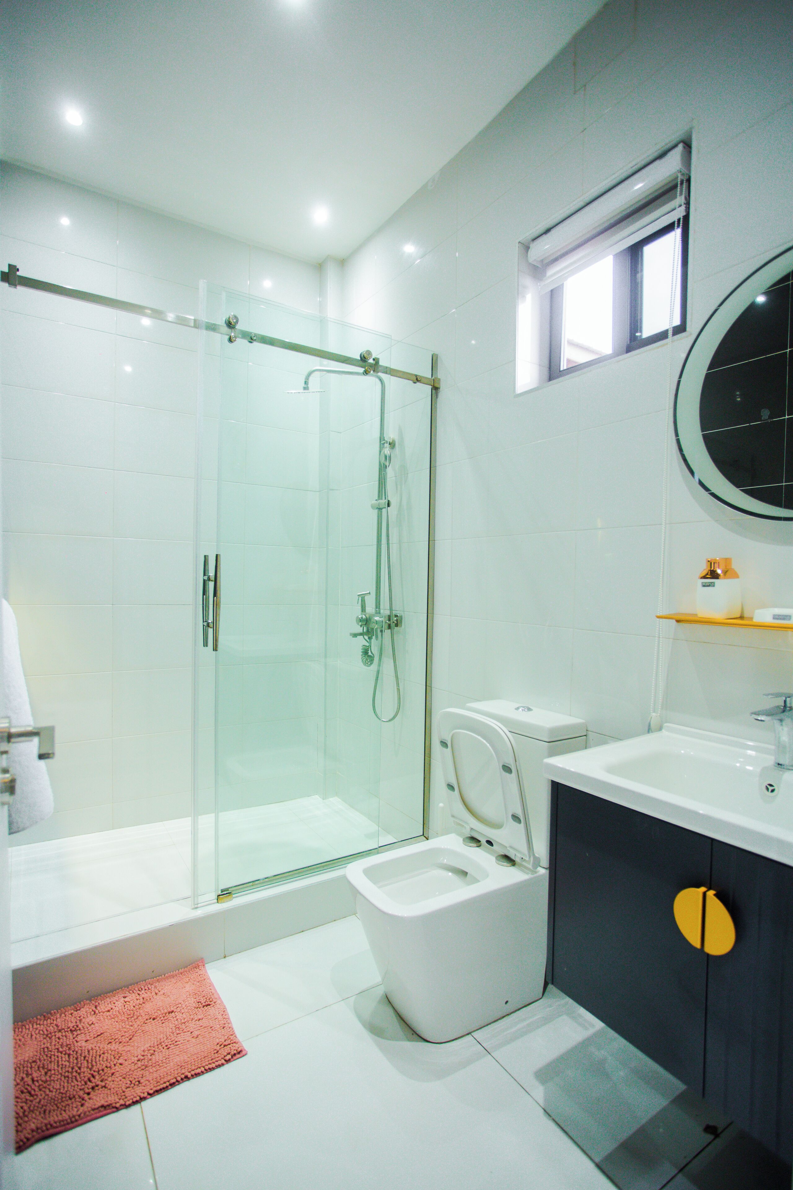 Shower, towels, soap, toilet paper