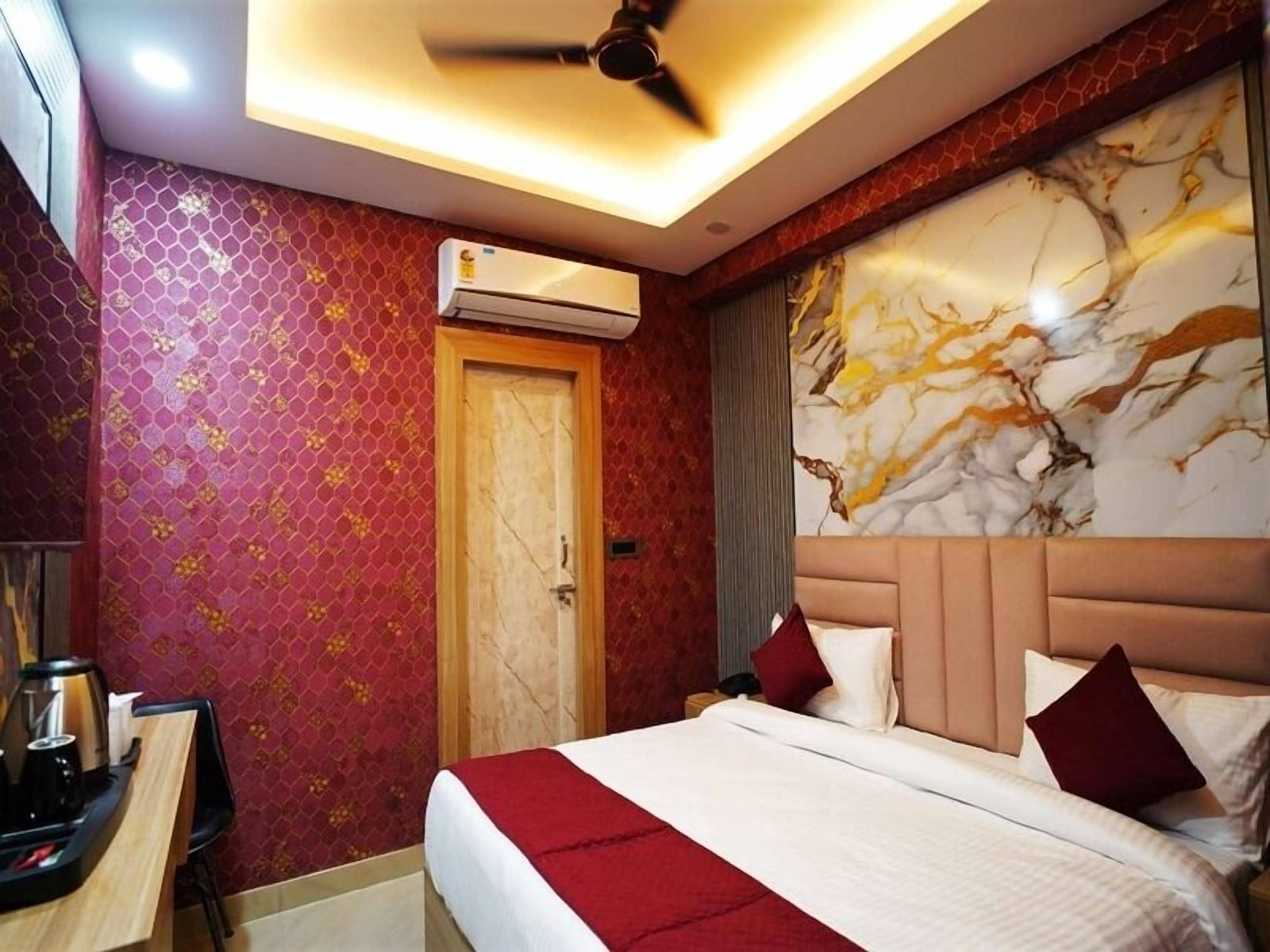 Luxury Suite, City View | Desk, laptop workspace, iron/ironing board, free WiFi