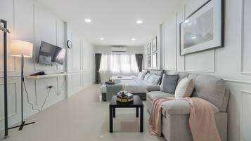 Deluxe Quadruple Room, 2 Queen Beds, Non Smoking | Desk, iron/ironing board, free WiFi