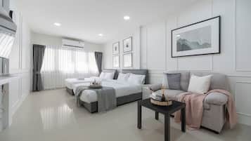 Deluxe Quadruple Room, 2 Queen Beds, Non Smoking | Desk, iron/ironing board, free WiFi