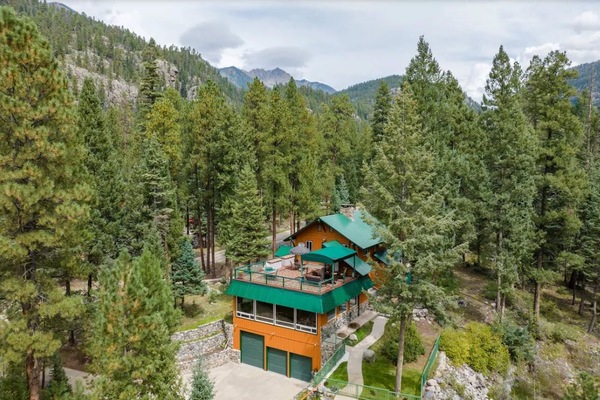 Private mountain retreat tucked among the pines with Vallecito Creek just below.
