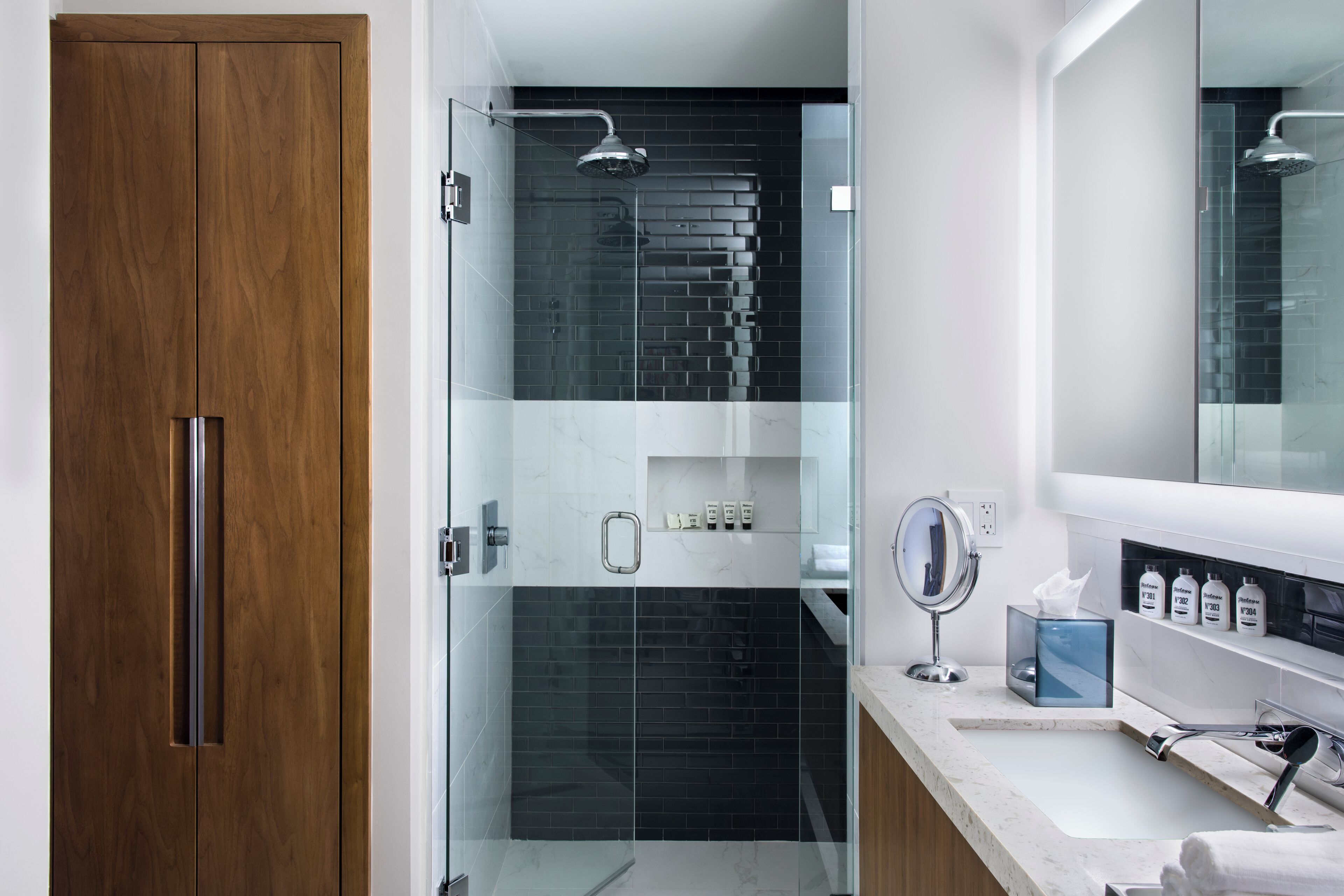 Designer toiletries, hair dryer, towels, soap