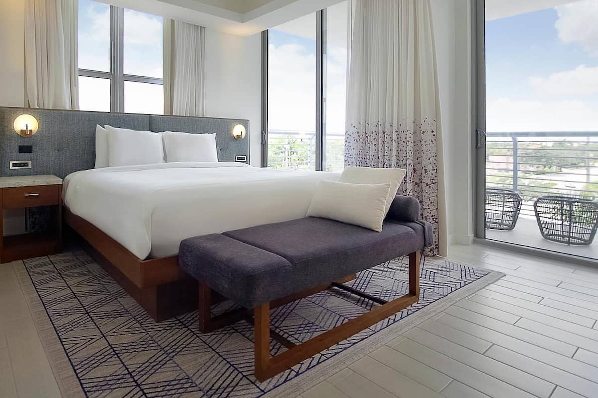 Signature Studio Suite, 1 King Bed, Non Smoking, Balcony | Living area | 50-inch flat-screen TV with cable channels