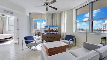 Signature Condo, 2 Bedrooms, Non Smoking, Balcony | Living room | 50-inch flat-screen TV with cable channels