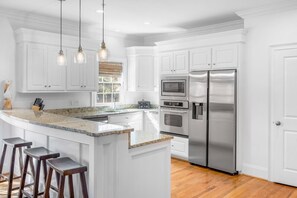 Fridge, microwave, oven, stovetop - 6 Bedroom IOP Home w/ Community Pool Just Outside | Steps from Beach and Fun (Isle of Palms)