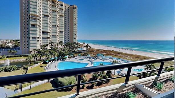 A high-rise hotel with a pool area and beach view. - Edgewater #611 | Beach Access, Pool, Gym, Hot Tub, Grills + More (Miramar Beach)