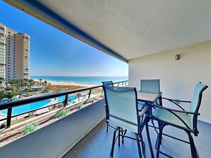 Outdoor dining - Edgewater #611 | Beach Access, Pool, Gym, Hot Tub, Grills + More (Miramar Beach)