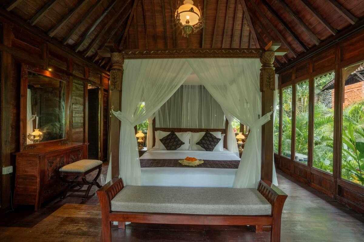 Luxe suite, uitzicht op tuin, aan tuin | Luxe beddengoed, bedden met traagschuimmatrassen, een minibar