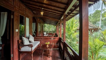 Suite estudio estándar, vistas a la piscina, en la zona del jardín | Terraza o patio