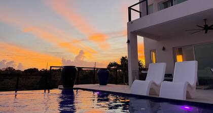 Resort style ocean view 4-bedroom villa with infinity pool in Long Bay Hills